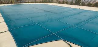 Pool covers certainly help maximize your pool's potential by keeping them warm. Mesh Vs Solid Pool Cover Pros Cons Comparisons And Costs