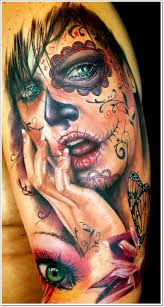 Marigolds are commonly added to these tattoos, and other day of the dead tattoos, because they are considered the flower of the dead. 40 Bloodcurdling Day Of The Dead Tattoos