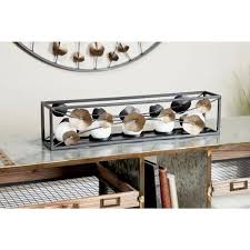 Novica, the impact marketplace, features unique iron candle holders and decorating ideas by talented artisans worldwide. Litton Lane Rectangular Black Iron Candle Holder With Bronze Modern 3d Floral Design 46273 The Home Depot