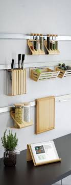 Via abeautifulmess diy pull out kitchen sink storage trays 27 Smart Kitchen Wall Storage Ideas Shelterness