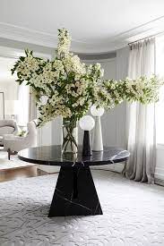 A combination of white and beige is used in this arrangement adding yellow flowers in a large marble vase complements the colors and balances the environment. 55 Easy Flower Arrangement Decoration Ideas Pictures How To Make Beautiful Floral Arrangements