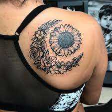 50 Meaningful And Beautiful Sun And Moon Tattoos Moon Tattoo Floral Back Tattoos Shoulder Tattoos For Women