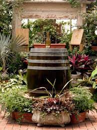 Wine bottle fountains really simple to make and can become the center of your garden. How To Create A Wine Barrel And Bottle Fountain Hgtv