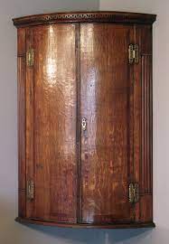 It also has a lower part which makes up stand. Antique Oak Corner Cupboard Wall Hanging Corner Cupboard Antique Corner Cupboard Wall Corner Cupboard Corner Display Cabinet Oak Corner Cupboard Corner Cupboard