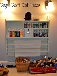 Follow this tutorial to turn those square, plain ikea cubbies into a statement piece that looks like a pottery barn apothecary console! Pottery Barn Craft Organizer Craft Room Organisation Craft Room Organization Modern Patio Furniture