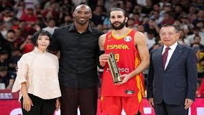 ريكي روبي أفضل لاعب في مونديال السلة فاز صانع العاب المنتخب الإسباني ريكي روبيو بجائزة أفضل لاعب في كأس العالم لكرة السلة ا Academic Dress Tops Sports Jersey