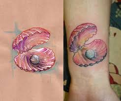 Shell tattoos ocean tattoos mermaid tattoos body art tattoos tatoos nautical tattoos arrow tattoos word tattoos desenho new school. 20 Beautiful Shell Tattoo Images Pictures And Design Ideas
