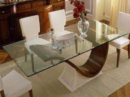With its chrome legs and glass table top, this table has a modern look and feel, while still being able to fit with any color decor. Glass Top Tables Magnifying Beautiful Dining Room Design Glass Dining Room Table Glass Top Dining Table Glass Top Dining Table Rectangle