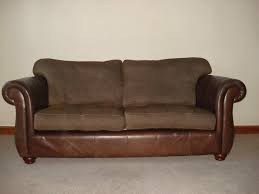 leather sofa brown with fabric cushions