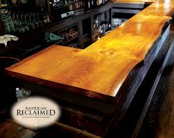 Here's a helpful guide to maintaining a rustic wood countertop, from choosing the style, the wood types, the pros, and the cons. Counters And Bartops American Reclaimed