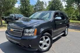 Image result for Black Granite 2012 Tahoe