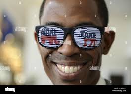 Brandon Little, of Winter Haven, Florida, wear sunglasses with the GOP (R)  and Democratic logos, at the Conservative Political Action Conference  (CPAC), March 4, 2016, in National Harbor, Maryland. Thousands of  conservative