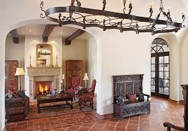 Terracotta Floor Tile Living Room Mediterranean With Arch Doorway Area Rug Ceiling Lighting Chande Spanish Style Homes Mediterranean Living Rooms Spanish Decor