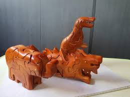 These puzzles will stand up to years of use. Vietnamese 3d Wood Puzzle Dinosaur Dragon And Elephant Toys Games Bricks Figurines On Carousell