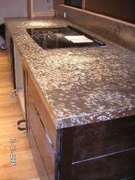 Stainless steel is the most popular metal countertop, but other options include copper, pewter and zinc. Ways To Make A Stainless Steel Countertop More Attractive And Unique Stainless Steel Countertops Stainless Steel Countertops Cost Stainless Countertops