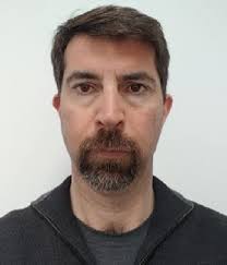 A cavity-enhanced MEMS-based photoacoustic sensor for ppt-level trace-gas  detection