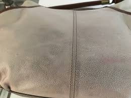 Dry thoroughly with the towel, buffing as you go to restore luster. Cleaning A Leather Purse Thriftyfun