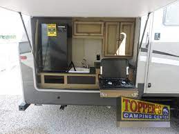My first one had a handle. Fifth Wheel Rvs With Outdoor Kitchens Convenience Meets Comfort Topper S Camping Center