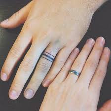 40 Awesome Wedding Band Ring Tattoos Tattoo Wedding Rings Ring Tattoos Wedding Band Tattoo