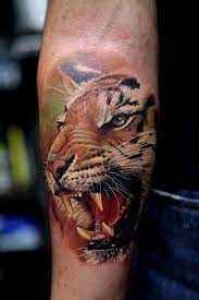 55 Awesome Tiger Tattoo Designs Art And Design Tiger Head Tattoo Tiger Tattoo Design Tiger Tattoo
