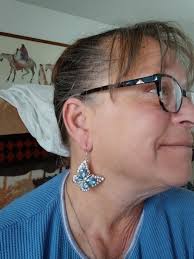 Zoey Deutch looked glamorous in Tiffany & Co. earrings at #THRNEXTGEN