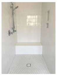 The floor slopes to the center from both ends. Tile Big Subway Tile Shower Bigsubwaytileshower Large White Subway Tile Shower Surround With Hexago White Tile Shower Shower Tile White Subway Tile Shower