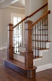 Bannister Custom Homes Metal Balusters Stained Banister Painted Risers Stained Treads Stair Remodel Modern Stairs Staircase Design