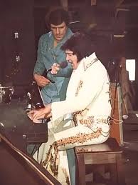 The last photographs of Elvis Presley are hard to look at — not because  they show weakness, but because they show a man who gave every piece of  himself to the world