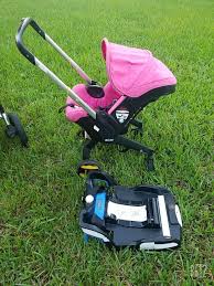 Up For Sell This Pre Loved Doona Car Seat With Base In Color Pink See Pictures For Actual Condition As Well As Manufactu Doona Car Seat Car Seats Bob Stroller