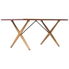 1950s Cross Leg Table By Hans J Wegner From A Unique Collection Of Antique And Modern Dining Room Tables At Https Www Dining Table Legs Table Teak Table