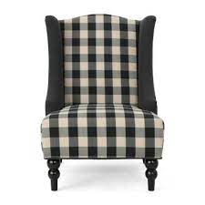The raspberry farmhouse accent chair, named for our famed farmhouse in aurora, new york, features a tufted back, custom black and white checked buttons and cording, and our exclusive fabric decking underneath the base of the seat. Plaid Accent Chairs Chairs The Home Depot