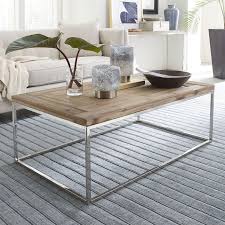 This reclaimed wood table is handcrafted and has a lower ledge that you can use to add picture frames and decors. Ace Reclaimed Wood Coffee Table