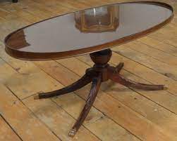 This is a very nice mahogany oval coffee table with brass claw feet. Mersman Mahogany Coffee Table W Glass Top No 7376 Estate Personal Property Furniture Tables Online Auctions Proxibid