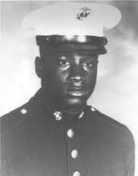 Marine Pfc. Robert Simanek was severely injured after he rolled onto a  grenade to protect members of his patrol in 1952.