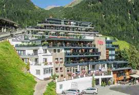 The apartment has 2 bedrooms, a tv with satellite channels, an equipped kitchen with a dishwasher and a microwave, and 2 bathrooms with a shower. Hotel Fliana Superior In Ischgl In Tirol Rudelurlaub