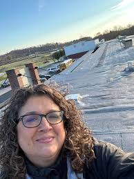 If you are out passing the school today, blow the car horn and wave at Mrs.  Black as she's spending the day in the roof of the school because the kids  met