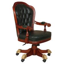 Leather has cracking on the seat and one area of separation in a crease. Sevan Mahogany Wood Leather Tufted Rolling Executive Office Chair
