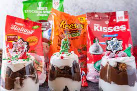 Peanut butter brownie trifle is a layered dessert of brownie pieces, homemade peanut butter pudding, mini reese's peanut butter cups, and whipped topping. Easy Christmas Trifle Brownies Whipped Cream And Candy