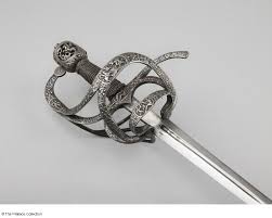 The short sword reads in latin i am made in solingen on both sides of the blade the other (executioner) has what looks like the mark of johannes wundes w with it seems unusual to see me fecit solingen applied in that configuration and on both sides of the blade without a makers name. Stale Session Small Sword Sword Design Swords And Daggers