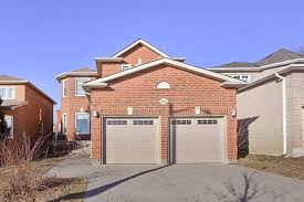 Residential or commercial garage doors sectional, roll up. 64 Casa Grande Street Richmond Hill Zolo Ca