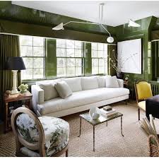 Green verging on grey with plenty of white trim on this contemporary works very well. Green Room White Couch Modern Traditional Southern Living Lacquer Yellow Chair Green Rooms Luxurious Room Living Room Green
