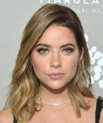 When her hair was a long, medium gold that faded. Ashley Benson Medium Wavy Cut Ashley Benson Hair Lookbook Stylebistro