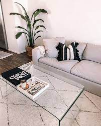 This enchanting grey rug has a studious quality to it. Fashion Jackson Living Room Grey Sectional Couch White Moroccan Shag Rug Glass Table Living Room White Coffee Table Living Room Coffee Table Decor Living Room