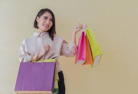 Bag shopping bag carry paper bag white bag woman sitting. Woman Carrying Shopping Bags 1269054 Stock Photo At Vecteezy