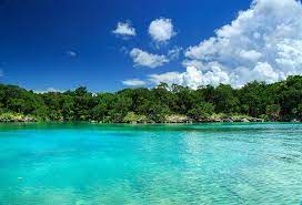 The blue lagoon is so clean that is shimmers a shade of blue. Blue Lagoon In Dominican Republic Photograph By Dmitry Sergeev