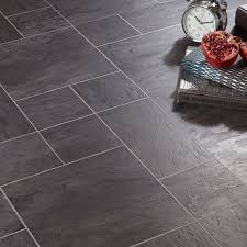 Stone can also be rough in homes with children pets or where barefoot is common meaning an untextured stone effect howdens professional slate effect grey laminate flooring. Black And White Tile Effect Laminate Flooring Laminate Flooring