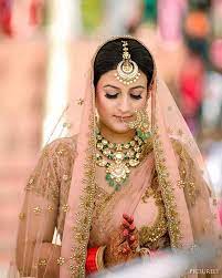 30 Breathtaking Bridal Maang Tikkas We Spotted On Real Brides Tikka Designs Maang Tikka Design Bridal Jewellery Indian
