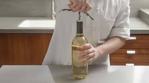 Be ready for the wine to splash a bit when the cork hits it.3 x research source. How To Use A Waiter S Corkscrew To Open A Bottle Of Wine