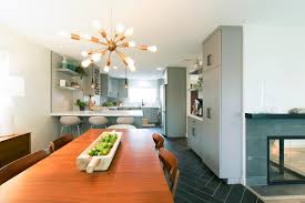 Sometimes simplicity is the best route to take. Gray Mid Century Modern Kitchen And Dining Room With Black Tile Floors Hgtv