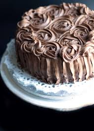 Outside of a steaming hot mug of cocoa, chocolate frosting is one of the best ways to enjoy this edible equivalent of love. Rich Vanilla Cake With Chocolate Fudge Icing Erren S Kitchen
